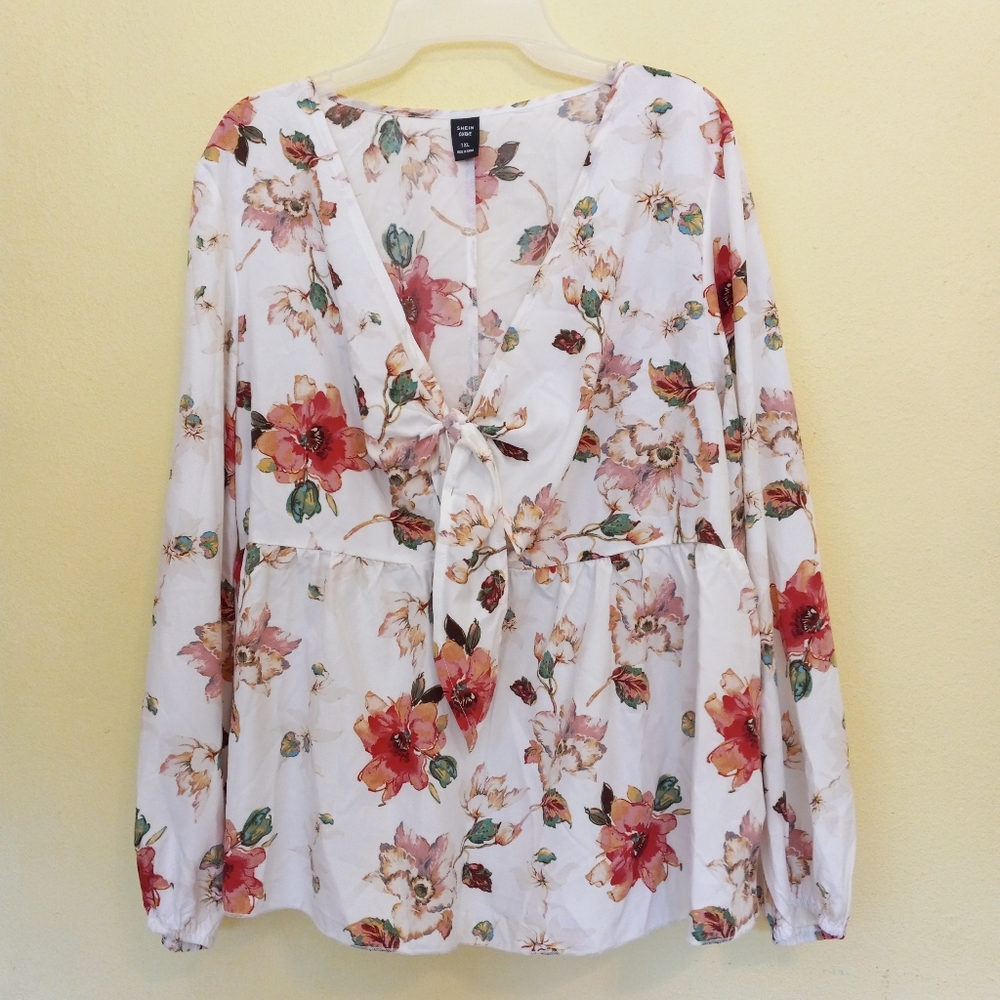 Plus Size Long-sleeved Floral Peplum Blouse 1XL